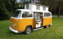 '71 1 Owner Devon Moonraker side view with pop top and open sliding door