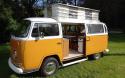 71 1 Owner Devon Moonraker side view with pop top and open sliding door