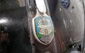 '54 Oval Window Rag-Top Beetle badge close up